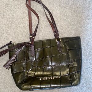 Dooney &bourke dark green “reptilian” purse with red interior
